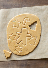 Rolled out dough for ginger biscuits. View from above.