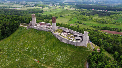 Checiny (Chęciny) medival castle located in Poland - swietokrzyskie voivodeship - look from the drone - above the building