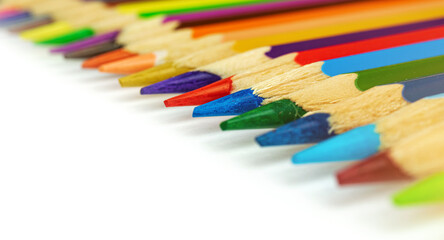 Colour pencils on a white background, sharp pencils macro photography