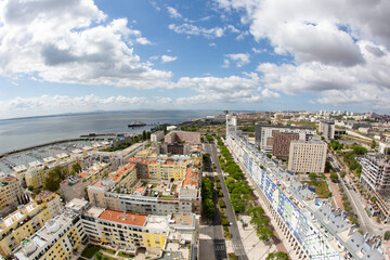 Parque das Nações neighbourhood aerial view. Located by the Tagus river, the modern buildings host mostly services and office spaces.
