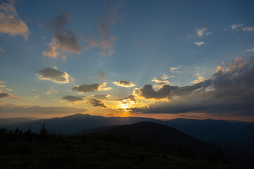 Beautiful colorful panorama of sunrise in the Ukrainian Carpathians