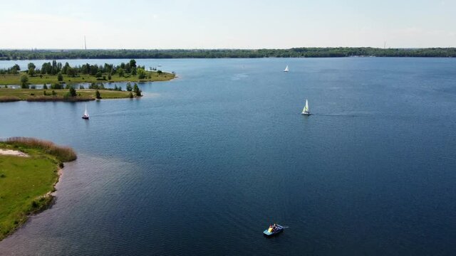 Aeral view: water sports on lake Cospuden (in German: Cospudener See) near Leipzig (Germany)