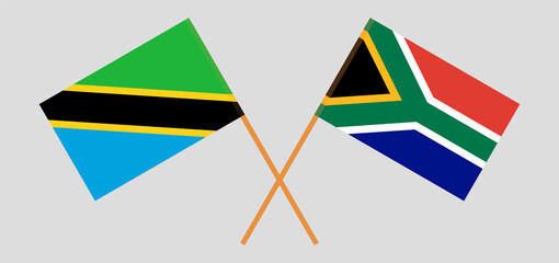 Crossed flags of Tanzania and Republic of South Africa. Official colors. Correct proportion