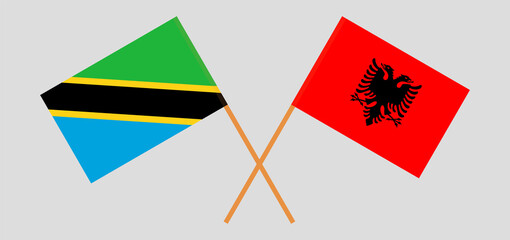 Crossed flags of Tanzania and Albania. Official colors. Correct proportion
