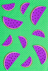 Pieces of watermelon made from paper on light background