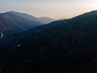 Aerial sunset view of Rhodope Mountains near Asenovgrad, Bulgaria