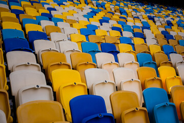 Naklejka premium Empty rows of seats in a football olympic stadium