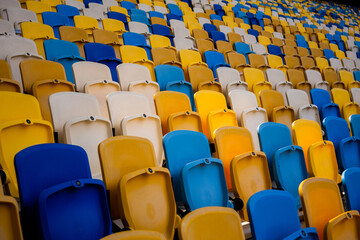 Fototapeta premium Empty rows of seats in a football olympic stadium