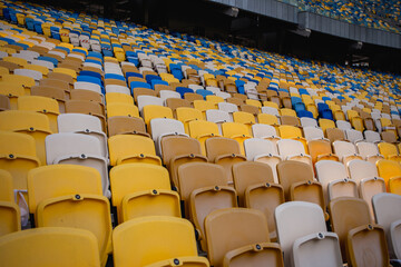 Naklejka premium Empty rows of seats in a football olympic stadium