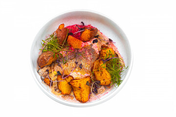 Fried fish, perch with baked potatoes. 