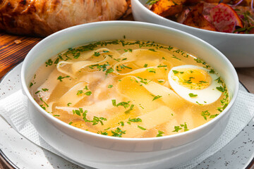 Ramen chicken with egg and noodles.