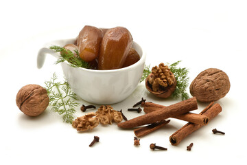 Eggplant jam preserves with walnut, Cinnamon and CLOVES  isolated on white background .Homemade...