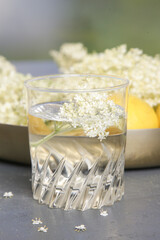 A glass of elderflower juice.	