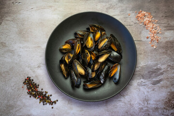 The mussels and the shrimp are ready to be cooked.	