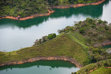Fototapeta premium View at the top of El Penon de Guatape looking out at a beautiful view of the lagoon. Close up