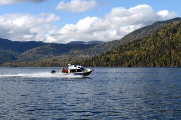 The NorthSilver PRO 745 Cabin boat of the transport police is patrolling the waters of Lake Teletskoye. Altai Republic