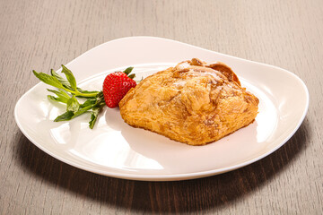 Sweet puff pastry served strawberry