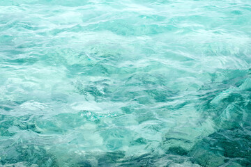 Fototapeta na wymiar surface of blue sea water background