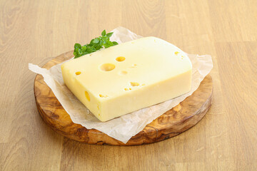 Maasdam cheese over the board