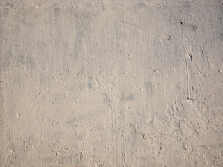 Beautiful brown textured stucco on the wall.