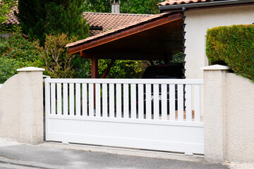 Metal portal white driveway entrance gates slide house access garage in suburb