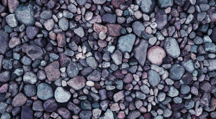 Natural rock pebble background shot.