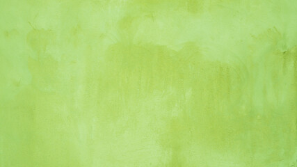 Fototapeta na wymiar Blind green blurred stucco texture.