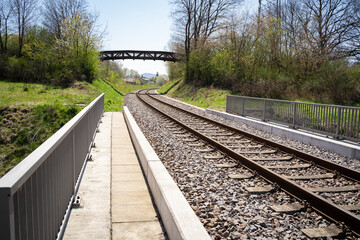 Fototapeta na wymiar Railroad tracks on concrete bridge