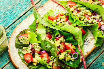 Healthy vegetable salad in chard leaves