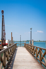 Wooden pier in the blue sea