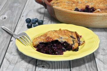 A serving of fresh, homemade blueberry cobbler