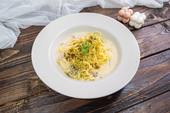 Italian Carbonara Spaghetti on a white plate