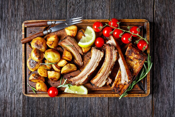 grilled pork ribs served with roast new potatoes