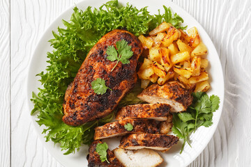 Jerk chicken breasts with grilled ananas cubes