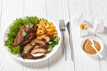 Jerk chicken breasts with grilled ananas cubes