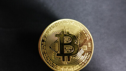 Bitcoin coin on black background new kind of investment with copy space