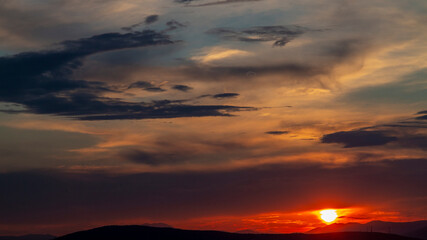 Sunset in Athens city in Greece. Sun looks like a big eye