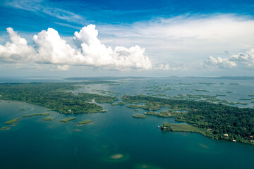 Tropical Island Aerial View. Wild coastline lush exotic green jungle. Red Frog Beach in Bastimentos Island, Bocas del Toro, Central America, Panama.