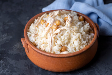 Traditional delicious Turkish food; Rice with chickpeas and chicken (Turkish name; Tavuklu nohutlu pilav or pilaf)