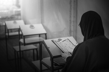 Praying at the shrine of Al-Abbas, the son of the Commander of the Faithful, in Karbala, Iraq