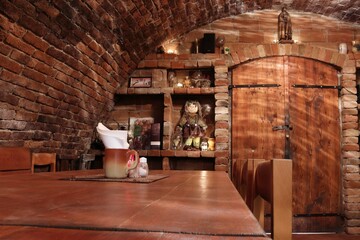 Sitting in the wine cellar. The magical atmosphere of the wine cellar.