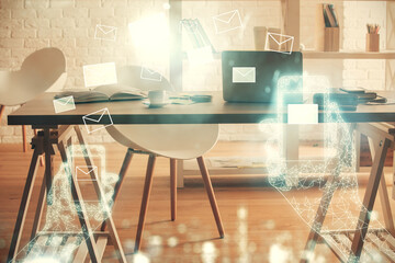 Multi exposure of envelops drawings and office interior background. E-mail concept.