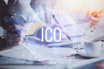 Double exposure of blockchain theme drawing over people taking notes background. Concept of cryptocurrency