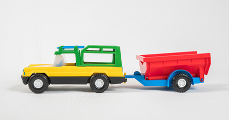 Plastic toy multicolored cars isolated on white background.