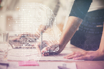 Multi exposure of woman hands working on computer and brain hologram drawing. Ai concept.