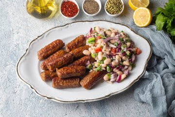 Turkish Tekirdag or inegol Kofte with Piyaz Salad