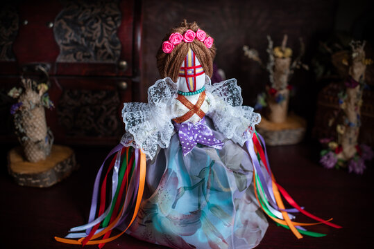 Magic handmade wish doll, attract money, love .Witchcraft with a doll. Concept of magic, esoteric