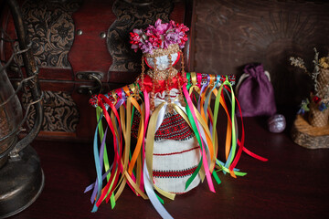 Magic handmade wish doll, attract money, love .Witchcraft with a doll. Concept of magic, esoteric