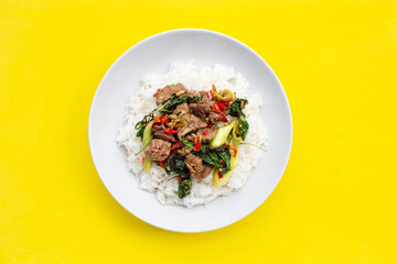 Rice topped with stir-fried beef with holy basil