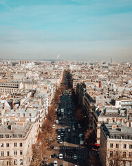 Vertical shot of a road surrounded by residential buildings in Paris, France